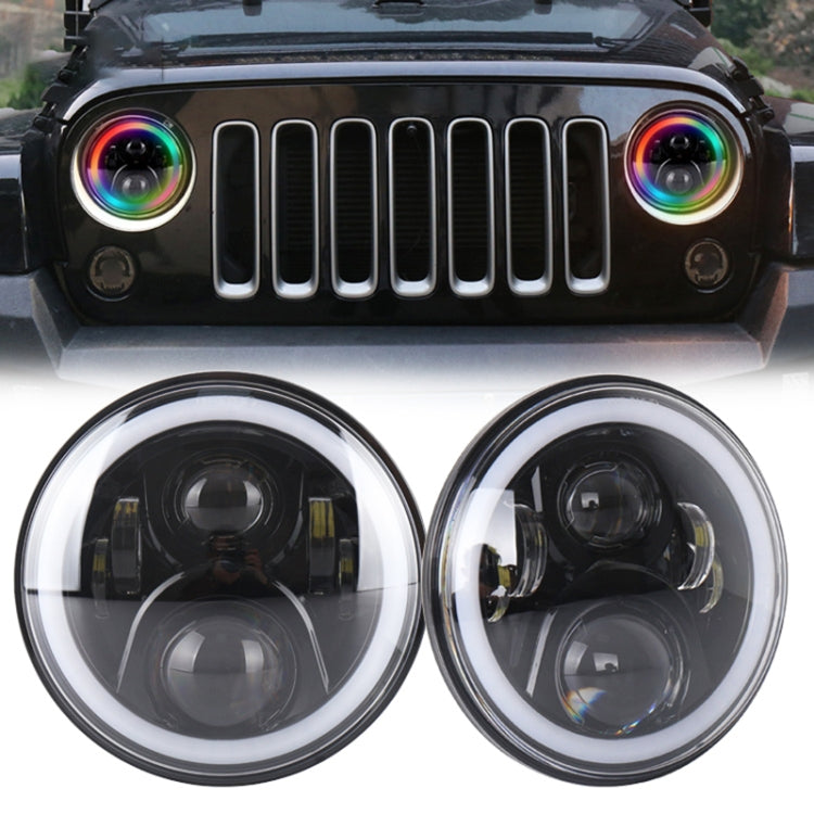 Two round LED headlights with RGB halo rings on a vehicle front grille