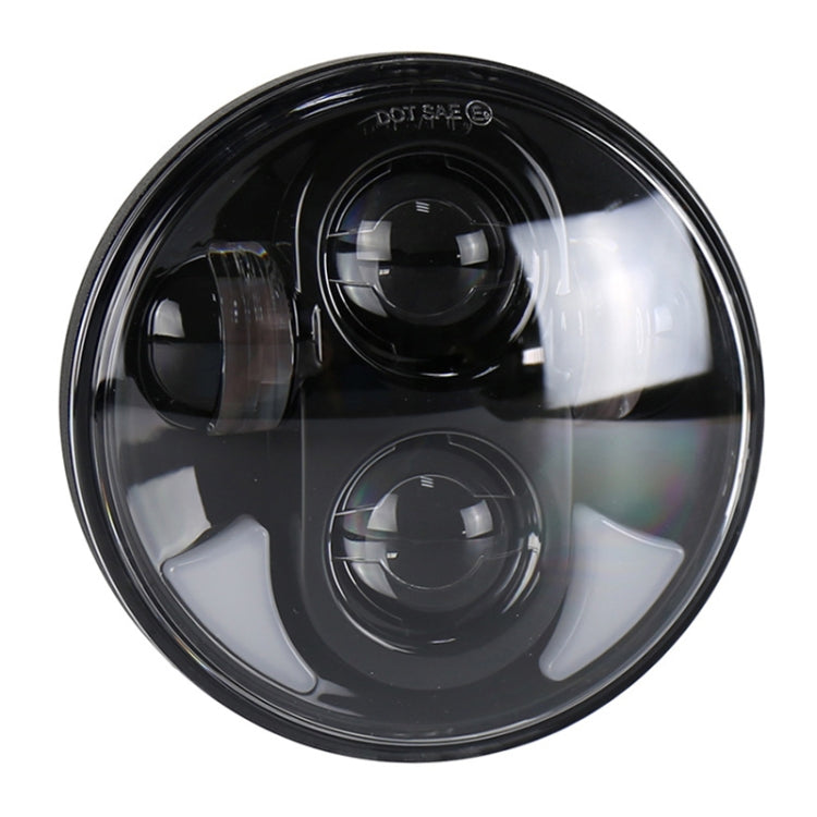 Black LED headlight with two round projector lenses and glossy outer bezel