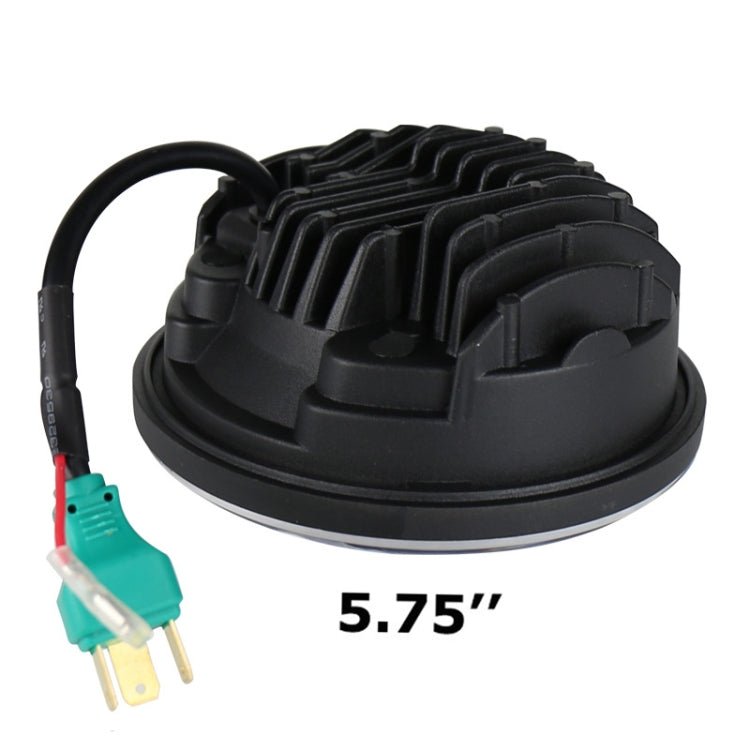 Black LED headlight module with heatsink, 5.75-inch marking, and wiring