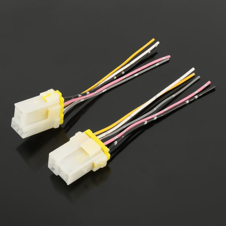Two white 5-pin relay socket bases with connected wire leads and yellow latches