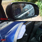 Rearview mirror rain blade installed on car mirror with water beads