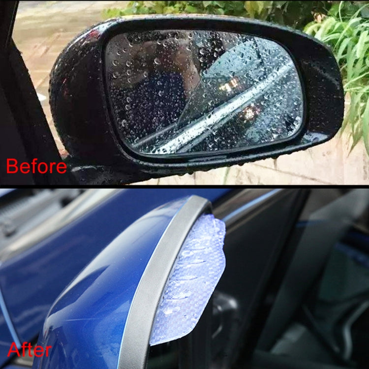 Rearview mirror rain blade installed on car mirror with water beads