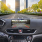 Car rear view monitor showing camera image with parking guide lines