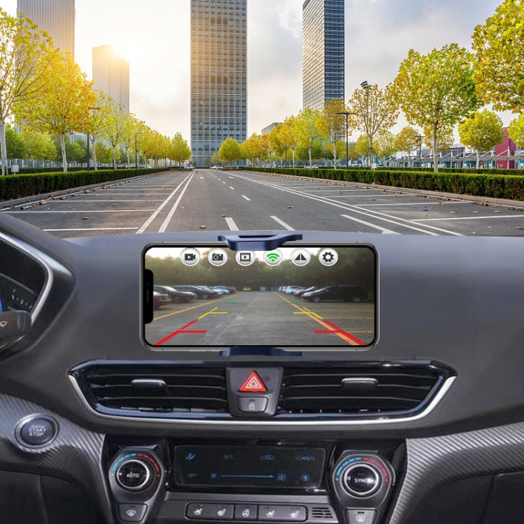 Car rear view monitor showing camera image with parking guide lines