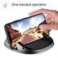 Car phone holder cradle holding a smartphone on black textured tray