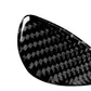 Black carbon-fiber curved oval sticker with woven texture and glossy finish