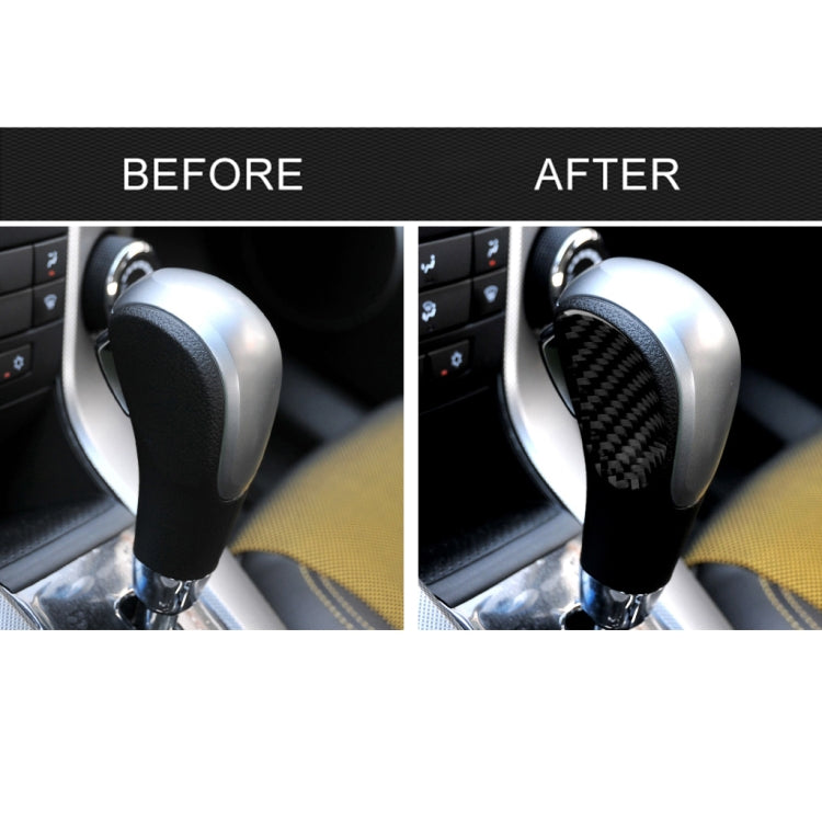 Black carbon-fiber gear shift panel sticker applied on center console shifter