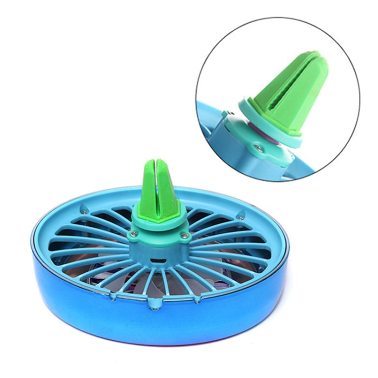 Portable car vent fan with mint-blue housing and green rotating top