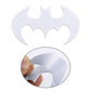 White bat-shaped metal car sticker with peel-off backing shown