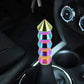 Iridescent long cone gear shift knob installed on a car shifter