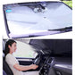 White car windshield sunshade installed over the front glass