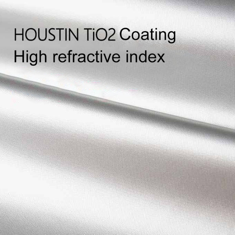 Car sunshade fabric close-up, light silver reflective coating texture.
