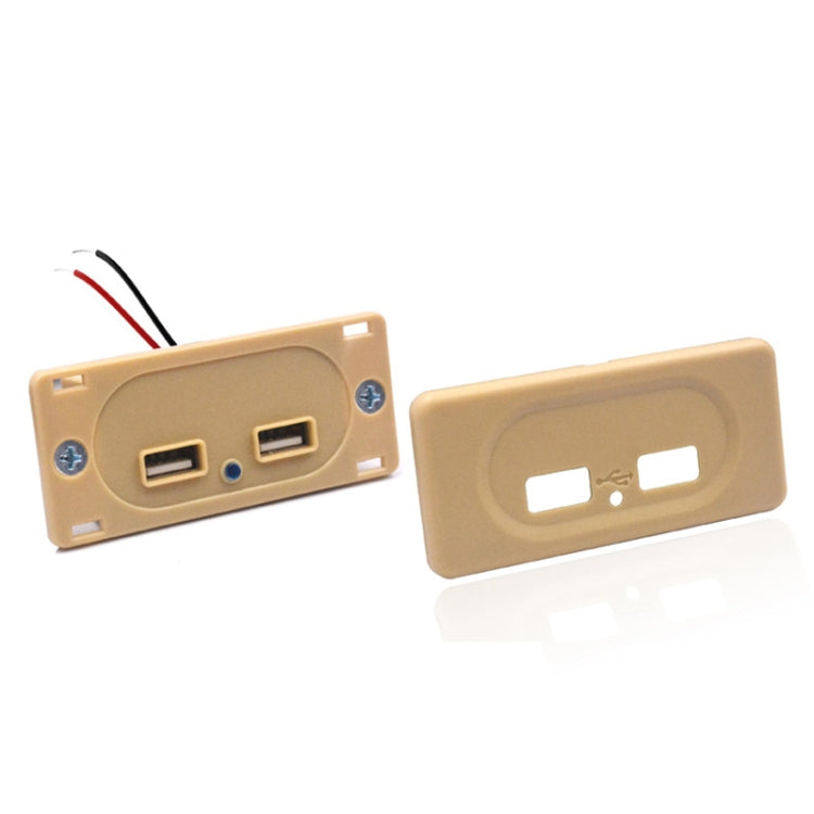 Beige dual-USB car charger faceplate with two USB ports and blue dot indicator