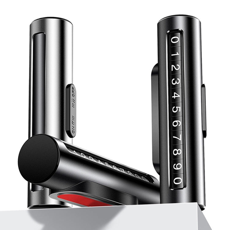 Silver metal parking number roller with black housing and red display insert