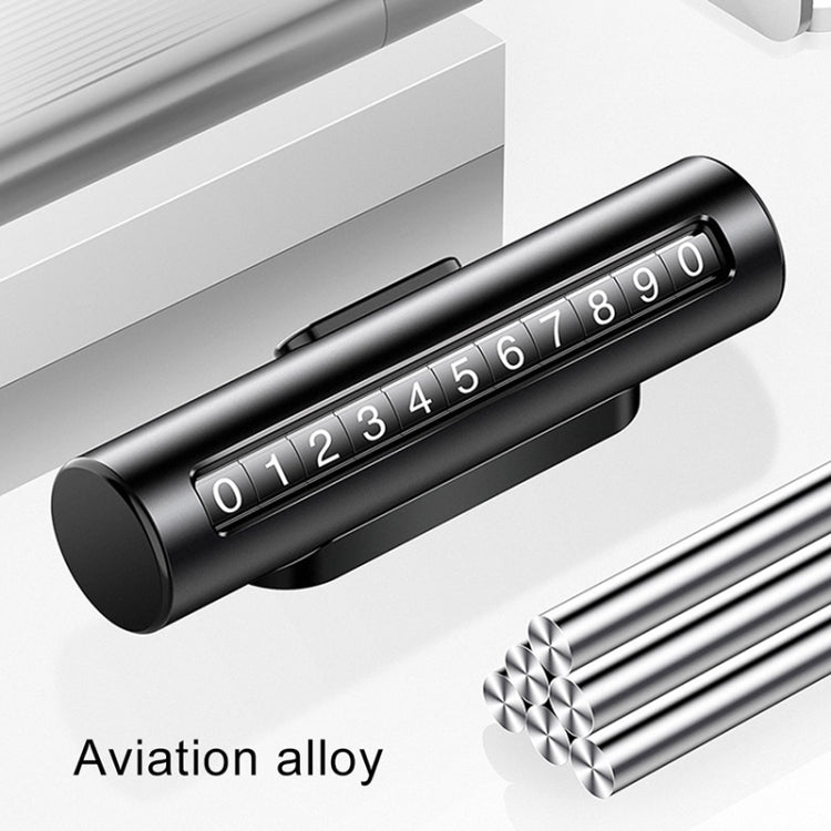 Black and silver metal parking number roller card with digit window and end caps