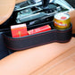 Black console tray organizer with cup holders and long storage bin on car seat