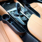 Black car center console organizer with two cup holders and slim storage channels