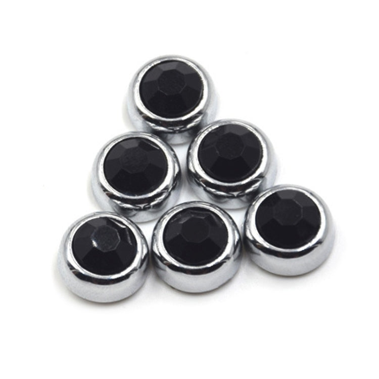 Car diamond sticker set with six black crystal studs, close-up on silver rims