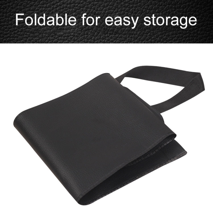 Black foldable umbrella storage bag with wide flap and carry strap