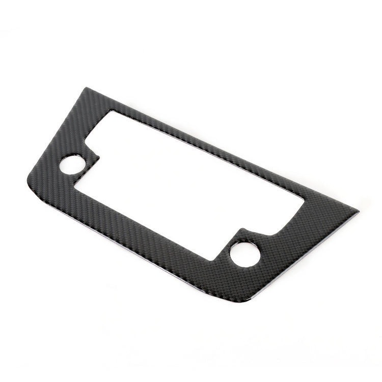 Carbon fiber-look trim plate with rectangular cutout and two round mounting holes
