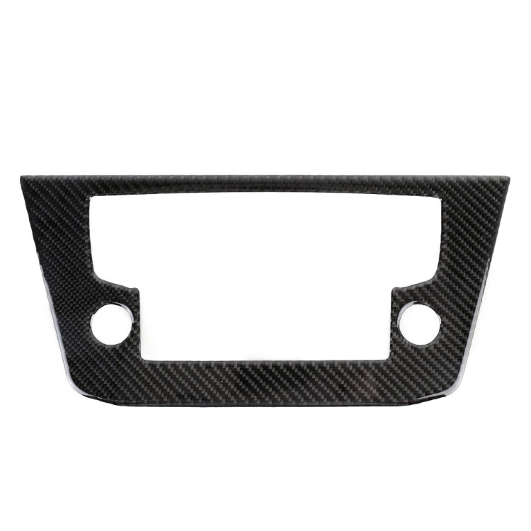 Black carbon fiber-look navigation surround with centered rectangular cutout and two side holes