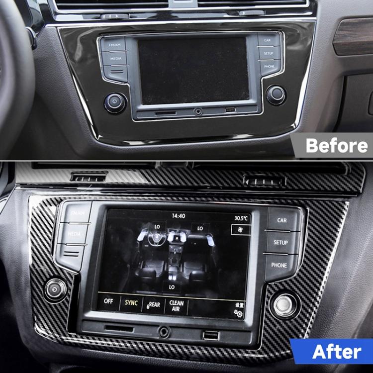 Installed black carbon fiber-look navigation frame trim around car display