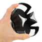 Black car cup holder held open by hand, showing dual cup compartments
