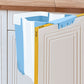 Blue wall-mounted folding trash can with folded side profile and hook tabs