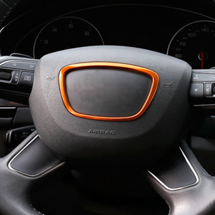 Orange steering wheel ring cover trim sticker shown on steering wheel