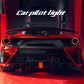 Square LED tail light with red glow and circular accents on rear car