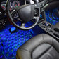 Car floor footwell lit with blue LED atmosphere lights under steering wheel