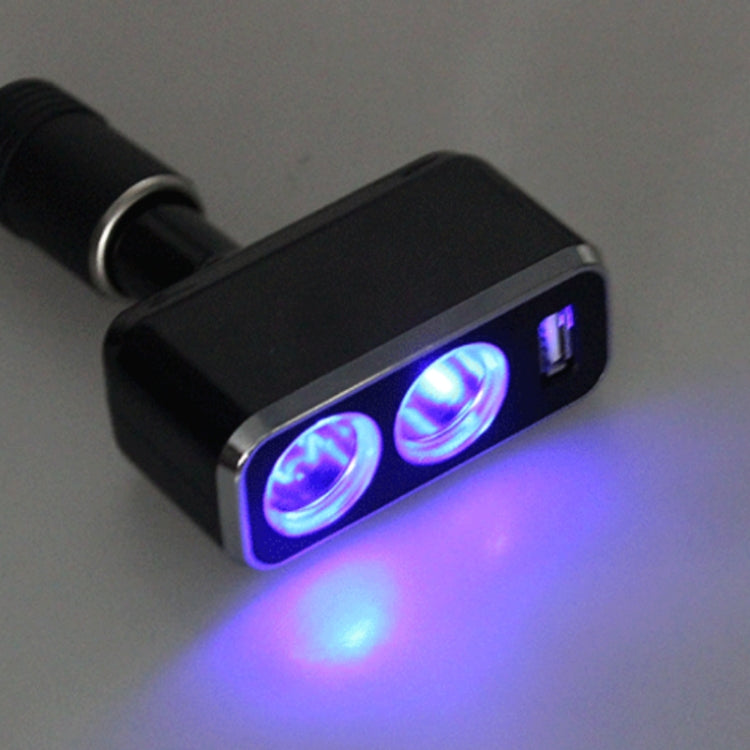 Black car USB charger with two circular ports and USB-A, blue indicator light on