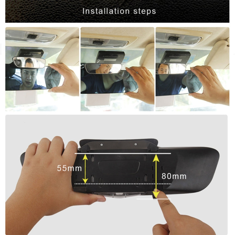 Rearview mirror installation showing hands mounting the black backing plate