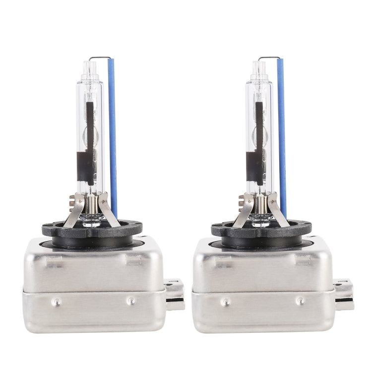Pair of HID xenon bulbs with silver housings, black mounting rings, and blue-tinted tubes