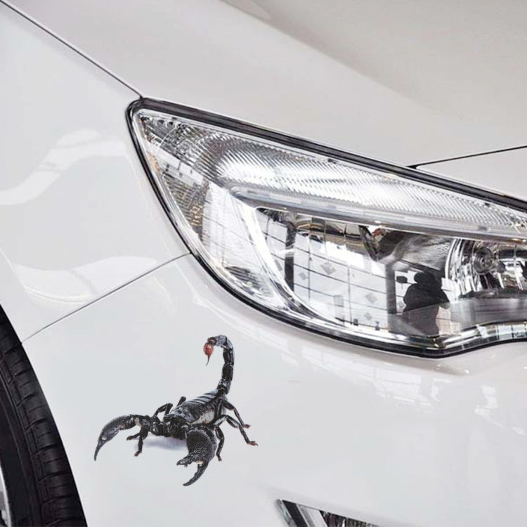 Scorpion animal-pattern car decal on white bumper near headlight