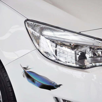 Feather-pattern car body sticker near headlight on white car panel