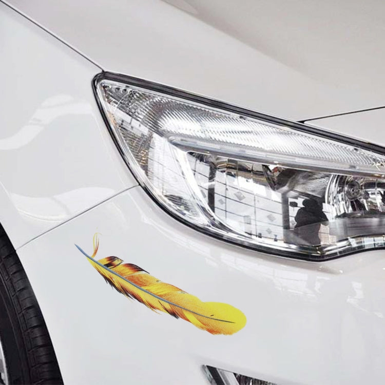 Feather car body sticker, multicolor feather design on white vehicle front near headlight