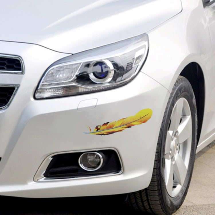 Feather car body sticker, multicolor feather on white car front by the headlight