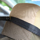 Black fastening strap and mesh panel on rear pet safety net barrier