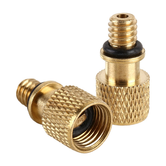 Brass-tone inflator adapters with textured grip and black rubber seal tips, threaded
