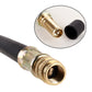Brass threaded coupler on black vacuum extension hose; ribbed socket detail