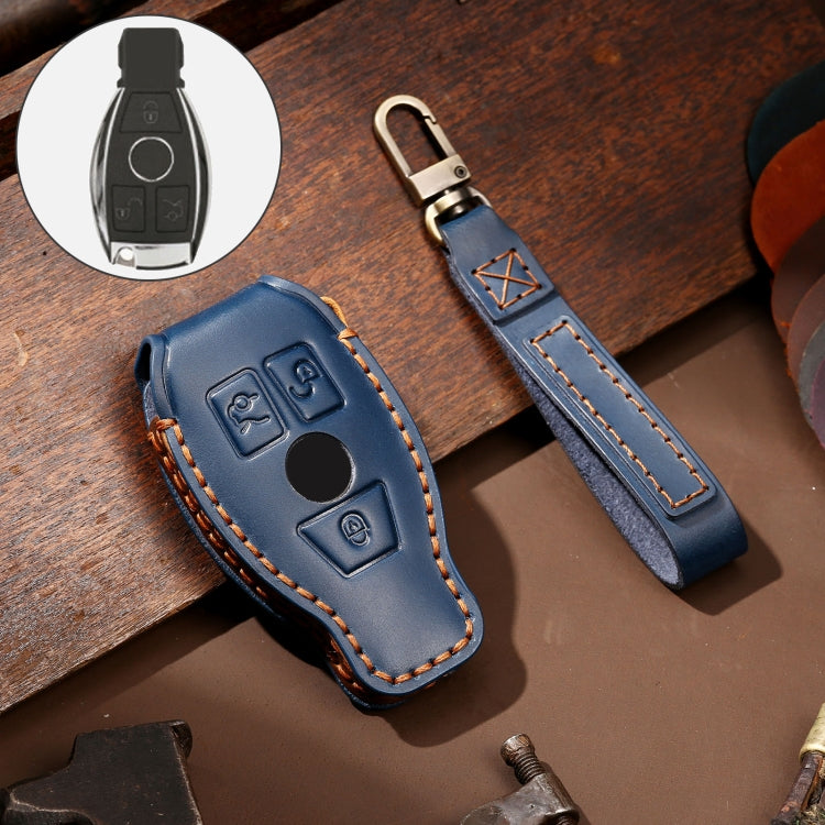 Blue cowhide leather key fob case, button cutouts, orange contrast stitching