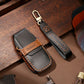 Black leather key protective cover case with orange stitching and car key fob cutout