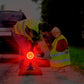 Flashing red LED emergency warning light placed on the road for roadside safety