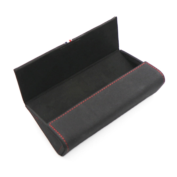 Black glasses storage bag open tray with red-stitched inner seam