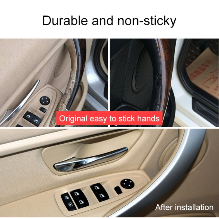 Beige interior door pull with armrest handle and window switch panel
