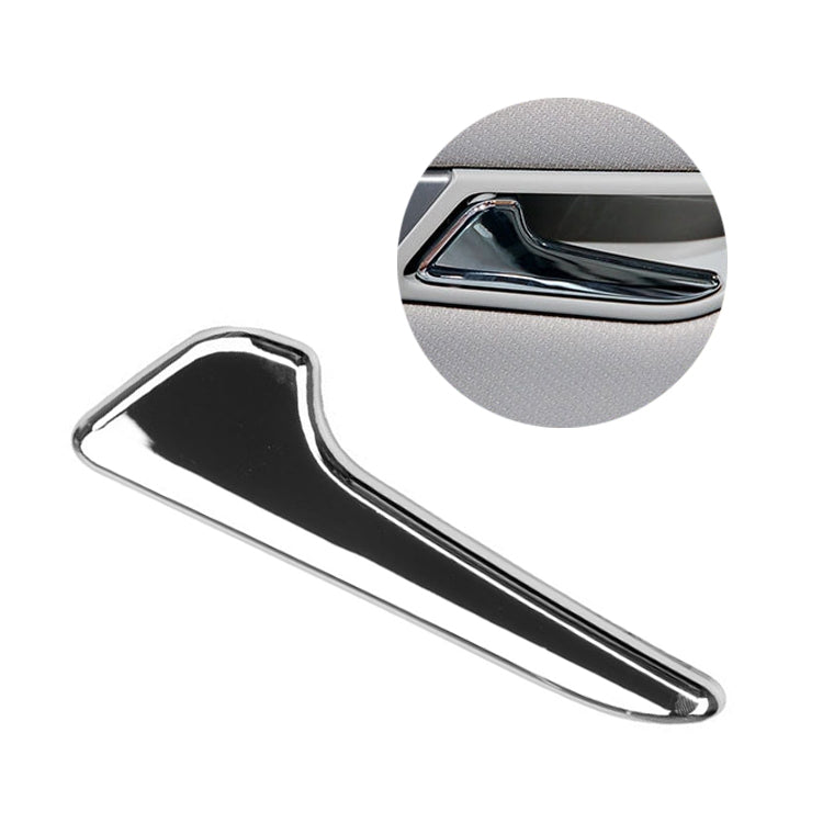 Chrome interior door pull handle trim with glossy black insert, left side