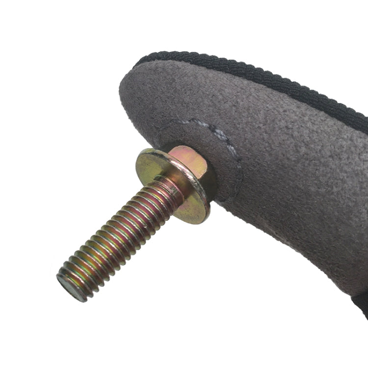 Close-up of black magnetic finger glove finger tip with brass bolt head