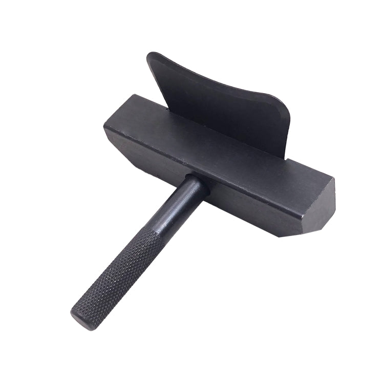 Black oil pan separator tool with textured handle and flat metal blade