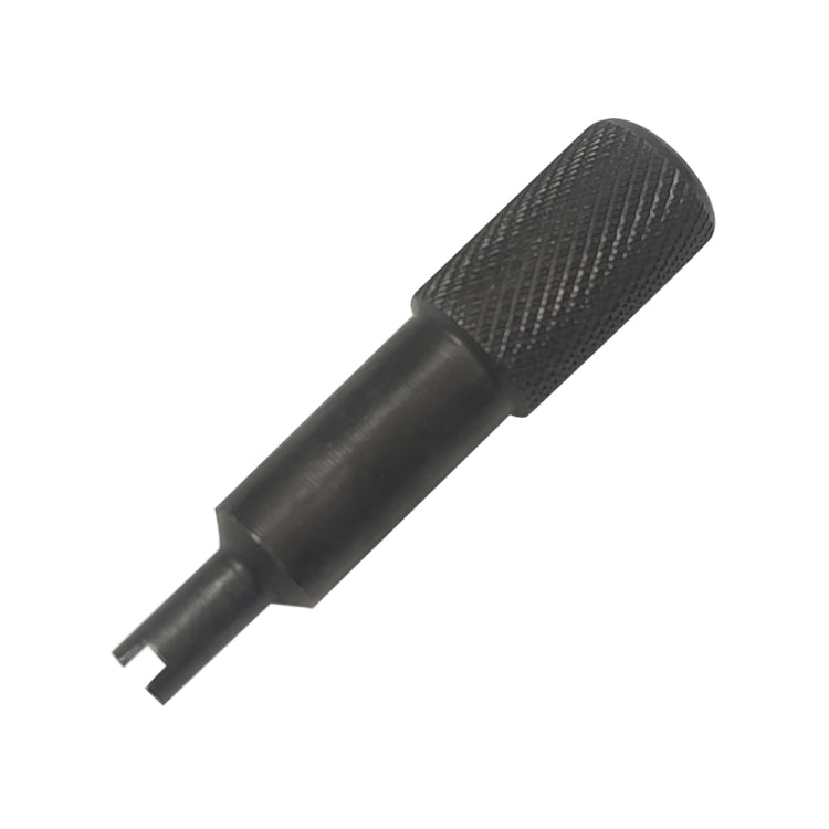 Car valve core remover tool with black handle and small insertion tip